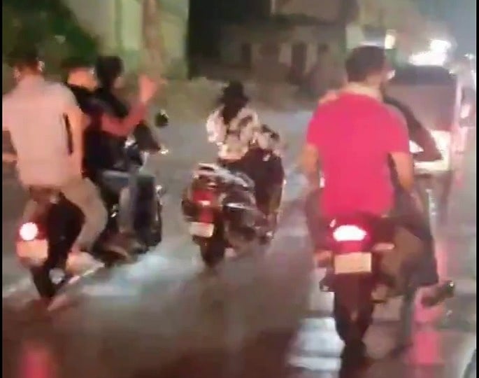 Agra bikers harass women riding a scooter